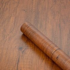 a close up of a wooden object on a table