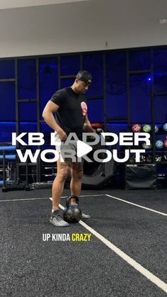 a man standing on top of a black floor next to a blue wall with the words klb ladder workout out