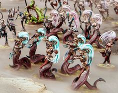 the warhammers are painted in different colors and sizes