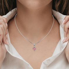 Fancy Pink Heart Solitaire Diamond Necklace made with a fancy Pink heart cut diamond in a four prong setting with adjustable chain. ✦ 𝐒𝐭𝐨𝐧𝐞 𝐃𝐞𝐭𝐚𝐢𝐥𝐬✧ Shape: Heart✧ Focal Stone Size: 1.00 CT, 1.50 CT, 2.00 CT, 2.50 CT, 3.00 CT✧ No of Diamonds: 1✧ Stone Type: Lab Grown Diamond ✧ Diamond Clarity: VS1+✧ Diamond Color: Fancy Pink ★ 𝐍𝐞𝐜𝐤𝐥𝐚𝐜𝐞 𝐃𝐞𝐭𝐚𝐢𝐥𝐬: ✧ Metal Type: Solid Gold ✧ Metal Purity: 14K Solid Gold, 18K Solid Gold ✧ Metal Tone: Yellow Gold, White Gold, Rose Gold✧ Setti Solitaire Diamond Necklace, Fancy Color Diamond Ring, Vs1 Diamond, Colored Diamond Rings, Halo Necklace, Solitaire Necklace, Diamond Solitaire Necklace, Halo Earrings, Halo Earrings Studs