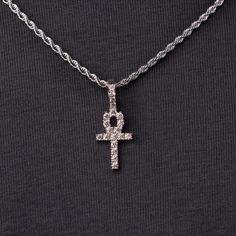 Known as “The Key of the Nile” the Ankh is one of the most sacred Egyptian symbols representing eternal life. We carefully hand-set all stones, executing top craftsmanship. This micro-sized pendant now in white gold is sleek and will accentuate any fit. This product is guaranteed for life - GLD will repair the item should you experience any defects in craftsmanship or breakage. Specifications - 11mm x 19mm (Width x Height) - Bail: Fits up to 4mm Rope Chain - Weight: (Weight can vary +/- 0.5 gram The Ankh, Ankh Cross, Egyptian Symbols, The Nile, Vermeil Jewelry, Custom Earrings, Eternal Life, Pendant Bracelet, Drop Necklace