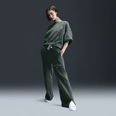 Grounded in style, comfort and versatility, meet our take on luxury loungewear. With a high-waisted fit and hem vents, these pants help keep you looking anything but basic while still feeling ultra cozy. Midweight brushed fleece holds its shape, and a wide ribbed waistband with a drawcord feels comfortably snug. Nike Sportswear For Lounging, Athleisure Wide-leg Sweatpants For Elevated Casual, Nike Relaxed Fit Leisure Activewear, Elevated Casual Wide-leg Sweatpants In Athleisure Style, Nike Sweatpants For Loungewear In Fall, Nike Sweats With Elastic Waistband For Loungewear, Nike Sweatpants For Fall Loungewear, Nike Athleisure Bottoms For Lounging, Nike Full-length Relaxed Fit Sweatpants