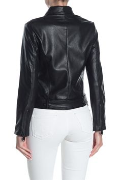 Zip and buckle details elevate this faux leather moto jacket with edgy style. Fit: this style fits true to size. Notch collar. Long sleeves with zip cuffs. Front zip closure. Adjustable belted hem. Faux leather construction. Lined. Approx. 23" length (size S). Imported Trendy Faux Leather Jacket With Zipper Closure, Leather Jacket With Zipper Closure For Fall, Leather Jacket With Zipper For Fall, Moto Leather Jacket With Asymmetrical Zip For Fall, Trendy Leather Jacket With Zipper Closure For Fall, Trendy Leather Jacket With Zipper For Fall, Fitted Leather Jacket With Zip Cuffs For Spring, Edgy Leather Outerwear With Zipper Closure, Fall Leather Biker Jacket With Asymmetrical Zip