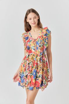 This fun and flirty mini dress is perfect for any summer occasion! The beautiful multi pop floral print will have you standing out in any crowd. And the ruffled bodice adds just the right amount of flirtiness. Pair this dress with wedges or sandals for a look that's sure to turn heads. Multi pop floral Chiffon Ruffled bodice Sleeveless Sheer Lining Mini length Hand wash cold Do not bleach Do not tumble dry Iron low Shell: 100% Polyester Lining: 100% Polyester HN719D Total length: 34.5", Bust: 35" XS MULTI: Height 5'9" / Bust 30.5" / Waist 24" / Hips 34.5" Dress With Wedges, Ruffled Mini Dress, Chiffon Ruffle, Floral Chiffon, Bodice, Floral Print, Floral Prints, Chiffon, Hand Wash