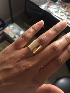 Minimalistic style wide band gold ring is definitely a transitional piece. Dress it up or dress it down, this minimalistic style will make that edgy and bold statement you're looking for. Material(s): 14kt Gold Filled Metal Measurements: 12mm wide or 15mm wide What is gold-filled vs. gold-plating? Gold filled is the next level quality alternative to solid gold. Gold filled is an actual layer of gold (10kt, 12kt or 14kt) pressure bonded to another metal base metal such as brass or bronze. There’s Gold Band Ring Design For Women, Thick Rings For Women, Gold Rings Thick, Big Gold Rings, Pink Locket, Brushed Gold Ring, Guy Jewelry, Thick Band Ring, Band Gold Ring