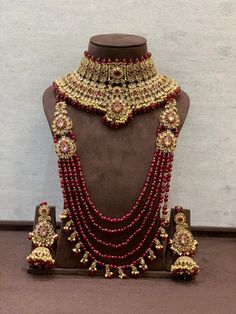 Dazzling Kundan Jewelry With Elegant Design, Dazzling Elegant Kundan Jewelry, Elegant Bridal Sets With Stone Work For Gift, Elegant Bridal Sets With Stone Work As A Gift, Classic Gold Wedding Sets, Elegant Kundan Round Bridal Sets, Elegant Kundan Bridal Sets, Hand Set Ruby Bridal Sets For Wedding, Elegant Ruby Bridal Sets For Festive Occasion