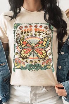 Spread good vibes with our Butterfly Graphic Tee! Made with high quality materials and a stylish design, this tee will make a statement wherever you go. The butterfly graphic adds a touch of beauty and positivity to your wardrobe. Feel good and look good with our Good Vibes Graphic Tee! Unisex Crew Neck Short Sleeve .High Quality Direct To Film Printed Graphic Design.100%COTTON,HEATHER(52%COTTON,48%POLY),ATH.HEATHER,BLACK HEATHER(90%COTTON,10%POLY) Short Sleeve Graphic Tee With Butterfly Print, Butterfly Print Crew Neck Graphic Tee, Relaxed Fit Short Sleeve T-shirt With Butterfly Print, Casual T-shirt With Butterfly Print, Black Cotton T-shirt With Butterfly Print, Butterfly Graphic, Fall Denim, Romper And Jacket, Film Prints