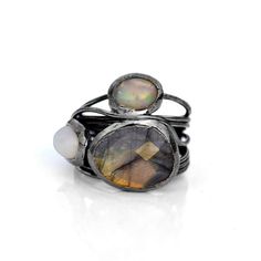 GemFormingStudio D E T A I L S Labradorite Ring | Fire Opal Ring | Wire Wrapped Ring | Gemstone Ring | Ring For Her, Ring For Women, Statement Ring, Stackable Ring, Unique Ring Size : All sizes Available Weight : 5.62 gm Stone Size : 16 x 13 mm Material : Brass Polish : Gold Polish . Contact us for wholesale prices. R I N G S https://www.etsy.com/in-en/shop/GemFormingStudio?section_id=22783374 B E A D S https://www.etsy.com/in-en/shop/GemFormingStudio?section_id=22828835 W A N D S https://www.et Fusion Rings With Natural Stones For Anniversary, Fusion Style Natural Stone Rings For Anniversary, Fusion Style Natural Stones Ring For Anniversary, Fusion Style Anniversary Rings With Natural Stones, Open Opal Ring With Natural Stones For Anniversary, Fusion Style Stackable Round Rings, Fusion Rings With Oval Natural Stones, Fusion Oval Rings With Natural Stones, Fusion Style Oval Rings With Natural Stones