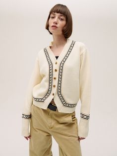 "Editor's NotesThis cardigan is crafted from a wool blend featuring a warm feeling. Sleeves are designed with a slightly relaxed length and finished ribbed cuff. The natural ivory color and unique pattern create a vintage style.- Natural ivory color- Contrasted color's pattern and buttons are harmonious- Loose fit silhouette- Rebbied neckline, cuff and hem features high quality and also prevent from stretchMeasurements(in.)One size(XS-M)- Total length: 23.03 in. - Shoulder: 17.32 in.- Chest: 21.65 in.- Sleeve length: 24.60 in.- Hem: 17.51 in.Model info:- Alma: Height 5'7" Bust: 29.92 in. Waist: 24.01 in. Hips: 35.43 in. - Ana: Height 5'6" Bust: 21.49 in. Waist: 25.59 in. Hips: 36.61 in.Composition & Care- 22% WOOL 10% NYLON 65% ACRYLIC 3% SPAN- Dry cleanDesigner- by&nbsp W Concept, Knitwear Cardigan, Ivory Color, Knitting Designs, Unique Patterns, Color Patterns, Wool Blend, The Natural, Vintage Style