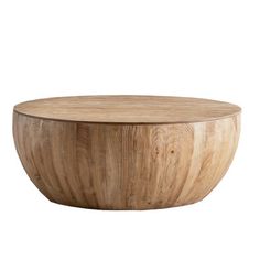 a wooden bowl sitting on top of a table