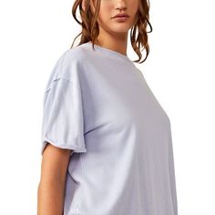 When we are looking for a casual style and a comfortable fit, we end up with the Free People Nina T-Shirt every time. Made with a cotton main fabric, the Nina T-Shirt is soft and keeps us comfortable all day long. the relaxed fit and loose and flowy cut add an extra flair of style, and the dropped shoulders and the raw-edge seaming improves the comfort. Comfortable Blue Cotton T-shirt, Relaxed Washed Cotton Tops, Basic Washed Cotton Top, Relaxed Spring Loungewear T-shirt, Washed Short Sleeve T-shirt For Everyday, Relaxed Fit Washed T-shirt, Casual Plain Cotton T-shirt, Relaxed Fit Top With Shirttail Hem, Cotton Loungewear Tops Washed