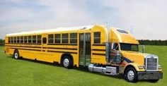 a yellow school bus parked in a grassy field