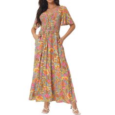 A floral maxi dress featuring a round neckline, short sleeves, and a shirred waist with a flowy silhouette. The semi-loose cut of this dress paired will quickly make this dress a favorite! This color is 100% Rayon, for a better dress experience, suggest ironing it low before wearing it! Enjoy all of the compliments in this bohemian maxi dress! Great for casual, work, beach, date, party, honeymoon, holiday, family gatherings and photoshoots, etc. Multicolor Maxi Dress With Elastic Waistband For Summer, Multicolor Smock Maxi Dress For Spring, Bohemian Smocked Short Sleeve Dress With Floral Print, Bohemian Smocked Dress With Short Sleeves And Floral Print, Bohemian Smocked Dress With Floral Print And Short Sleeves, Multicolor Smocked Dress With Short Sleeves, Elegant Multicolor Maxi Dress With Elastic Waistband, Short Sleeve Maxi Dress With Gathered Waist For Spring, Spring Maxi Dress With Gathered Waist And Short Sleeves