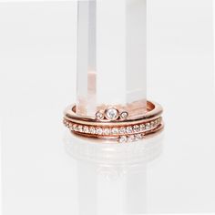 Izzie Minimal Ring - Diamond Band Stackable Ring in Gold - Midwinter Co. Alternative Bridal Rings and Modern Fine Jewelry Minimalist Stackable Rings With Diamond Accents, Dainty Eternity Band With Single Cut Diamonds, Rose Gold Stackable Rings With Single Diamond, Dainty Diamond Stackable Rings In Rose Gold, Delicate Rose Gold Stackable Rings With Diamond Accents, Delicate Rose Gold Stackable Rings With Diamond, Dainty Rose Gold Diamond Stackable Rings, Minimalist Stackable Rings With Rose Cut Diamonds, Dainty Stackable Rings With Rose Cut Diamonds