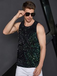 This men's black sequin tank top shirt is a stylish way to make a statement. Crafted with lightweight fabric and eye-catching sequins, it is perfect for dressing up any outfit. Durable stitching ensures a comfortable fit with no sagging. 100% Polyester Pull On closure Hand Wash or Dry Clean Quality polyester material, luxurious and lightweight fabric, soft and comfortable Brand Size Chest Waist S 43.7 40.6 M 45.7 42.5 L 48.7 45.5 XL 51.7 48.5 XXL 54.6 51.5 Sequin Tank Top, Winter Knit Hats, Sequin Tank, Sequin Tank Tops, Boot Accessories, White Sleeveless, Black Sleeveless, Winter Knits, Silver Man