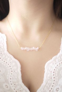 Raw crystal necklace of rose quartz, perfect gift for bridesmaid, friends and family members. Size of gemstone strand: about 40mm. Length of necklace: Can be chosen from 14 to 30 inches. ------------------------------------------------ Necklace and component options: ▲ 14 k gold filled ▲ 18 k gold plated brass base ▲ Silver plated brass base ▲ Antique plated brass base ------------------------------------------------ The price is for one necklace. Please kindly understand that every crystal is n Delicate Pendant Crystal Necklace With Clavicle Chain, Minimalist Crystal Necklace With Natural Stones As Gift, Dainty Rose Gold Pendant Crystal Necklaces, Dainty Rose Quartz Pendant Jewelry, Gold Crystal Necklaces With Natural Stones For Wedding, Rose Quartz Necklace With Natural Stones As A Gift, Minimalist Rose Quartz Gemstone Jewelry, Elegant Jewelry With Raw Stone For Gifts, Minimalist Rose Quartz Jewelry As Gift