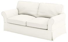 a white couch sitting on top of a hard wood floor