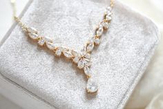 Ultra feminine with no shortage of sparkle, our Simple rose gold bridal necklace is perfect for adding a touch of glamour to your bridal look. Crafted with cubic zirconia stones, this necklace will become a forever favorite. - Created with Premium Cubic Zirconia stones- Available in rose gold, yellow gold, and rhodium finish.- Necklace measures 16 inches and extends to 18 inches- Decorative portion measures 3 inches- Decorative center drop measures 1.2 inches- Nickel free and hypoallergenic- PLE Gold Bridal Necklace, Simple Rose, Rose Gold Bridal, Bridal Necklace, Bridal Looks, Wedding Necklace, Gold Yellow, Magnolia, Diamond Necklace