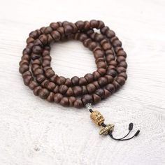 Mala Beads Fierce Mahakala Bodhi Mala ML623 Hand Wrapped Mala With Round Beads For Meditation, Hand Wrapped Round Beads Mala For Meditation, Hand Wrapped Mala For Meditation, Holistic Wooden Beaded Bracelets For Meditation, Artisan Wooden Beads Bracelet For Meditation, Holistic Healing Mala With Wooden Beads, Holistic Wooden Beads Mala For Rituals, Artisan 108 Beads For Meditation, Holistic Brown Mala With Wooden Beads