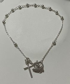 "Sterling silver rosary beads with preying hands and cross Stamped 925 GM  Stamped STER on the hands with C Excellent condition unsure of the date  21\" long  Weight 2.39g Any questions please ask  Please note box is display only  Thank you" Symbolic Silver Rosary Bracelet, Symbolic Silver Rosary Bracelet Gift, Silver Symbolic Rosary Bracelet As Gift, Symbolic Silver Rosary Bracelet For Gifts, Sterling Silver Cross Rosary Bracelet, Silver Cross Bracelet, Spiritual Style, Sterling Silver Spiritual Rosary Bracelet With Cross, Spiritual Sterling Silver Cross Rosary Bracelet, Spiritual Silver Cross Bracelet