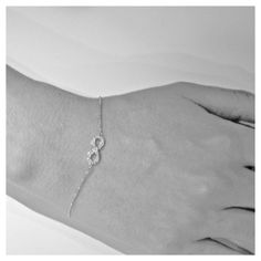 "Infinity refers to something without any limit. Our beautiful diamond Infinity jewelry is the perfect way to celebrate endless love or friendship. This special bracelet is available in your choice of 14k white, yellow, or rose gold! **Diamonds** 25 brilliant, full-cut, round diamonds, total weight 0.15 ct. VS2-SI1 clarity, G-H color **Setting and Chain** 14k gold, total weight 1.7 g 7\" chain adjustable to 7.75\" **Measurements** Be sure to check out our other Infinity items: http://www.etsy.co Diamond Infinity Bracelet For Anniversary, Infinity Diamond Bracelet For Anniversary, Elegant Infinity Bracelet With Diamond Accents, Elegant Infinity Bracelets With Diamond Accents, Elegant Infinity Diamond Bracelet For Formal Occasions, Dainty White Gold Infinity Jewelry, Infinity Diamond Bracelet With Accents For Anniversary, Silver Infinity Diamond Bracelet For Anniversary, Diamond Infinity Bracelets For Anniversary