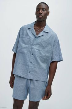 Available In Blue, Ice Blue, White, Stone, Oatmeal, Green and Black Fold Down Collar Front Button Closure Chest Pockets Short Sleeve 55% Linen, 45% Cotton Pair With "Bahamas Linen Cargo Shorts" Pair With "Bahamas Linen Shorts" Pair With "Bahamas Linen Pants" Imported | Mens Bahamas Linen Cuban Boxy Shirt in Blue size Large by Fashion Nova Blue Linen Camp Shirt With Relaxed Fit, Blue Linen Camp Shirt For Spring, Blue Relaxed Fit Linen Camp Shirt, Spring Blue Linen Camp Shirt, Blue Camp Shirt With Pockets And Relaxed Fit, Blue Relaxed Fit Camp Shirt With Pockets, Blue Short Sleeve Shirt With Spread Collar And Pockets, Blue Linen Camp Shirt For Vacation, Blue Linen Short Sleeve Camp Shirt