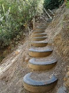 there is a set of stone steps going up the hill