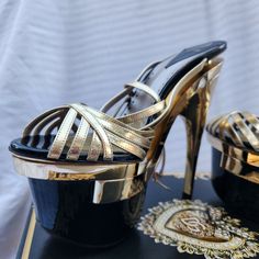 Versace Gold And Black Triple Platform Sandals, Never Worn Outside - Only Worn Inside The Cosmopolitan In Vegas 3 Times, Never Worn Outdoors On The Street - Rounded-Toe, Signature Gold-Tone Medusa Coin Detail - Approximately 2.5” Triple Platform - Approximately 6” Stiletto Heel Luxury Gold Sandals For Night Out, Luxury Gold Heels With Heel Loop, Luxury Sandals With Metal Feet And Round Toe, Gold Platform Sandals For Formal Occasions, Luxury Metallic Sandals With 4-inch Heel, Gold Leather Sandals For Galas, Gold Elegant Platform Sandals, Elegant Gold Platform Sandals, Gold Open Heel Sandals For Galas