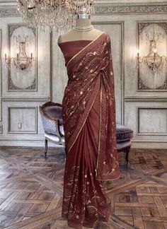 Beautiful brown shimmer georgette saree with sequins work and running blouse piece Sequin Pre-draped Chinon Saree, Festive Pre-draped Sequined Dola Silk Saree, Diwali Sequined Pre-draped Saree, Traditional Pre-draped Art Silk Saree With Sequins, Sequin Chinon Pre-draped Saree For Diwali, Semi-stitched Sequined Saree, Diwali Party Wear Georgette Pre-draped Saree, Elegant Pre-draped Chiffon Saree, Fitted Chiffon Saree With Resham Embroidery