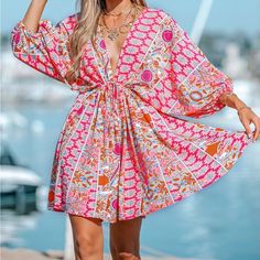 Cupshe - Just Add Water Bust:39.4-42.1in Waist:31.2-33.8in Hip:42.1-44.9in New With Tags Comes From Smoke And Pet Free Household Fast Shipping Pink Printed Beach Dress For Spring, Pink V-neck Sundress For Beach, Spring Pink Printed Beach Dress, Pink V-neck Sundress, Pink Printed V-neck Mini Dress, Pink V-neck Printed Mini Dress, Pink Vibrant Print Dress For Beach Cover-up, Pink Flowy V-neck Mini Dress, Pink Floral Print Beach Dress Cover-up