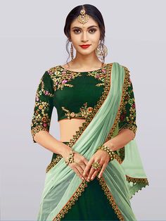 Showcase your best ethnic look with this mesmeric "dark green embroidered taffeta silk bridal lehenga choli" for women. Crafted from exquisite green color taffeta silk material, this lehenga exudes elegance and grace. The intricate dori work, zari work, and thread embroidery add a touch of opulence, making it a perfect choice for weddings, engagements, ethnic wear, evening events, and other special occasions.
The set includes a beautiful lehenga, a choli, and a net dupatta, all adorned with matc Green Organza Traditional Wear For Reception, Designer Green Lehenga With Traditional Drape, Green Organza Traditional Wear With Traditional Drape, Traditional Green Organza Wear With Traditional Drape, Green Lehenga With Traditional Drape For Designer Wear, Green Semi-stitched Lehenga With Dupatta, Semi-stitched Green Lehenga With Dupatta, Green Organza Choli With Intricate Embroidery, Green Organza Saree Traditional Wear