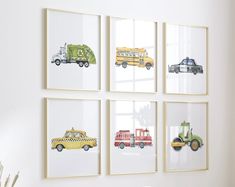 four framed pictures on the wall with different types of trucks and cars painted on them