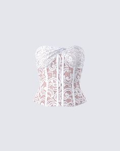 Slip into something magical with this white lace corset top ✨ With twist detailing, boning, and bust pads, this lined stretch lace piece is the perfect staple piece full of whimsy 🤍 Feminine Fitted Tube Top With Built-in Bra, Lace Corset With Sweetheart Neckline And Built-in Bra, Chic White Corset With Built-in Bra, Feminine Underbust Corset With Built-in Bra, White Underbust Bodice With Built-in Bra, Feminine Wedding Corset With Built-in Bra, Lace Underwire Corset With Lace Trim, Fitted Delicate Lace Corset, White Underbust Corset With Built-in Bra