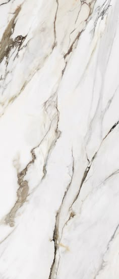 a white marble textured surface with brown accents