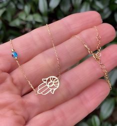 Very delicate and special ! The evil eye and Hand of Fatima is there for you to keep the negative energies away! ✨✨ P R O D U C T * D E T A I L S 14K Gold vermeil 925 Sterling Silver Size - 15.8 inches (~ 40 cm) 1.2 inches extension This necklace arrives in a charming gift package wrapped with love ❤️ . . . . . . . . . . . . . . . . . . . . . . . . . . . . . . . . . . . . . . . . . . ★ You can check out other lovely choices of jewelry in store Belita Design: https://www.etsy.com/shop/BelitaShop Dainty Evil Eye Jewelry For Good Luck, Gold Evil Eye Jewelry For Blessing, 14k Gold Evil Eye Jewelry Gift, 14k Gold Evil Eye Charm Necklace As Gift, Evil Eye Necklace Silver, Rose Gold Choker, Evil Eye Amulet, Evil Eye Hamsa, Gold Snake Chain