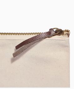 This new everyday bag is large and luxurious! It is made of 100% durable cotton canvas, with a gold zipper and leather zipper pull. It has a gusseted bottom, and at 9" wide by 7" tall, they're significantly bigger than our zipper pouches, and have a high-end feel. It is the perfect size for makeup, nail polish, coupons, spending money, receipts, office supplies, and so much more! 100% Durable cotton canvas Gold zipper and leather pull detail Gusseted bottom 9" W x 7" H Made in India, printed in Brown Canvas Bag With Zipper For Daily Use, Everyday Beige Cosmetic Bag With Zipper, Cotton Shoulder Bag With Zipper For On-the-go, Leather Canvas Bag With Zipper For Daily Use, Beige Canvas Shoulder Bag With Zipper Closure, Canvas Pouch Bag With Zipper For Daily Use, Canvas Bag With Zipper Closure For Daily Use, Daily Use Canvas Pouch Bag With Zipper Closure, Daily Use Canvas Pouch With Zipper Closure