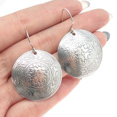 Great vintage condition.  CHATEAU D'ARGENT 925 Sterling Silver Vintage Floral Round Disc Earrings  Weight: 9.8g   WELCOME TO PAWN SHOP We are an actual pawn shop and have been in business for over 25 years. Since 1990, our establishment has been serving a variety of clients by providing them with short term cash solutions and options of liquidity regarding their treasured heirlooms. Acknowledging that today′s customers are very sophisticated and are looking for a variety of investments, our acquisitions are hand-picked for our special clientele. We do offer the most interesting items along with affordable prices. We do not disturb our vintage jewelry in order to keep its original patina leaving it to your discretion. Depending on your own taste, you can either polish it or keep it in the s Silver Engraved Round Earrings, Vintage Sterling Silver Engraved Earrings, Vintage Engraved Sterling Silver Earrings, Vintage Silver Engraved Earrings, Nickel-free Antique Silver Earrings, Disc Earrings, Pawn Shop, Hand Picked, 25 Years