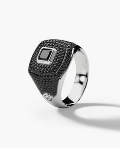 We will send you a size verification email once the purchase is completed. The BETZ iced out gold signet ring is a modern heirloom, featuring a showstopping princess cut black diamond surrounded by pave set brilliant cut black diamonds, with a total carat weight of 1.80. As with every Rockford piece, this black diamond signet ring is designed with individuality and custom izablility in mind. The BETZ signet ring, available in 16 variations, will quickly become your favorite pinky ring or stateme Black Rings With Diamond Accents And Black Spinel, Black Spinel Rings With Diamond Accents, Formal Black Rings With Black Diamonds, Luxury Black Diamond Ring For Anniversary, Luxury Black Diamond Ring With Brilliant Cut, Luxury Black Spinel Promise Ring, Classic Black Spinel Ring With Black Diamonds, Luxury Black Rings For Anniversary, Luxury Black Anniversary Rings