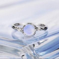 Brand New Never Been Worn And Still In The Box! Floral Design Genuine Round Cut Moonstone Ring White Gold Plated Sterling Silver Ring. Size = 5 Ring Moonstone, Rose Gold Charms, Moonstone Engagement, Semi Precious Gems, Floral Ring, Ring White Gold, Moonstone Jewelry, Cute Rings, Pretty Rings