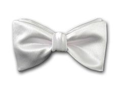 Formal white bow tie from our bow tie plain collection. Tuxedo bow tie. Perfect for your special occasion. Color: White Material: Japanese satin silk Bow dimensions: 4.5'' x 2.5'' Pre-tied bow tie neck size: Adjustable 14" - 22" Freestyle (self-tie) bow tie neck size: Adjustable 14" - 18" Made in USA Label: Kotty Design Code: FC1003 GIFT IDEA FOR HER: https://www.kottystyle.com/ Elegant White Suit And Tie Accessories For Party, Classic White Bow Tie For Wedding, White Tuxedo For Black Tie Event, White Ties For Black Tie Events, Elegant White Bow Tie For Black Tie Occasions, Classic White Tie For Wedding, Classic White Wedding Tie, Classic White Bow As Gift, White Bow Tie For Black-tie Events