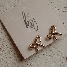 Introducing the Bow Earrings from Black Sheep Jewelry, the perfect blend of femininity + elegance. These chic bow stud earrings are crafted from 18k gold-plated stainless steel, making them tarnish-resistant + waterproof for lasting beauty + durability. Their trendy + girly design adds a cute touch to any outfit, effortlessly elevating your accessory game. Whether you're dressing up for a special occasion or adding a playful twist to your everyday look, the Bow Earrings are a must-have addition Girly Design, Mini Bows, Black Sheep, Bow Earrings, Water Proof, Everyday Look, Sheep, Gold Jewelry, Jewelry Collection