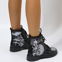 These Glamorous and Edgy Women's Gothic Style Ankle Combat Boots offer a classic round toe, lace-up design, 4 inch block heel, and anti-skid sole for ultimate safety while riding a motorcycle. Ideal for any occasion that requires both edgy and glamorous look. Item ID : UX05048 Patterned : Cartoon Material : Faux leather Occasion : Casual Heel Type : Block heel Closure : Lace up Toe Style : Round toe Type : Combat Black Fitted Martin Boots With Round Toe, Fitted Black Martin Boots With Round Toe, Black Lace-up Boots With Round Toe, Ankle-high Synthetic Lace-up Boots, Halloween Boots, Edgy Woman, Ankle Combat Boots, Riding A Motorcycle, Motorcycle Shoes