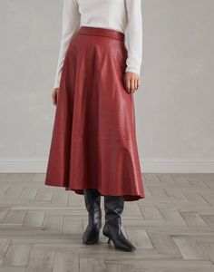 Natural leather midi circle skirt The refined natural leather reinterprets the classic style of this Circle Midi skirt in a contemporary way. The polished leather enhances the season’s colors and is paired with a relaxed, slightly flared silhouette, creating a sophisticated design contrast. The Midi length highlights the skirt’s feminine nature. Leather Midi Skirt For Work, Formal Leather Flared Skirt, Formal Flared Leather Skirt, Leather Midi Skirt With Lining, Leather Lined Midi Skirt, Leather Relaxed Fit Lined Skirt, Classic Leather Skirt For Fall, Classic Knee-length Leather Skirt, Relaxed Knee-length Leather Skirt