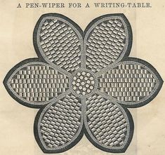 an old book with black and white designs on it