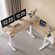 two computer desks with numbers on them sitting next to each other