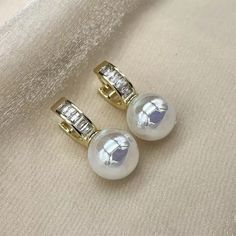 White/Pink Round Pearl Earrings Wedding JewelryMaterial: Brass, Cubic Zirconia, Simulated PearlWEIGHT: About 7.3gPACKAGE CONTENT: 1 pair of earrings, opp bag Round Pearl Earrings, Jewelry Pearls, Pearl Earrings Wedding, Ear Ring, Pink Round, Writing Gifts, Gold Party, S Jewelry, Trendy Earrings