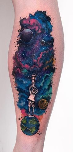 a man with a tattoo on his leg is standing in front of the moon and stars