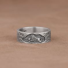 Lion and Lioness Mural Engraved Textured Band Ring, 925 Sterling Silver Animal Art Ring, Handmade Unsual Leo Promise Ring, Cool Wedding Band Made of 925 silver and handcrafted by hand, this ring is not only an accessory piece that complements your daily elegance, but also has details that will reflect your character and style. It is also a great gift to give to your loved ones on their special days. At SavisSilver, we always give importance to the satisfaction of our customers, we recommend you Adjustable Silver Etched Ring, Adjustable Etched Silver Rings, Engraved Open Skull Ring As Gift, Engraved Skull Open Ring Gift, Engraved Open Skull Ring Gift, Silver Etched Open Ring, Sterling Silver Symbolic Snake Ring Collectible, Sterling Silver Snake Ring Collectible Symbolic, Collectible Symbolic Sterling Silver Snake Ring