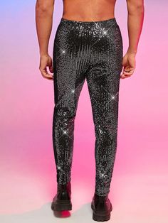 These dress pants feature a unique blend of sequined glitter fabric that adds a fashionable and stylish look to any wardrobe. They are crafted in a slim fit for an enhanced silhouette and come in a variety of colors to match any outfit. They offer a luxurious feel and give any outfit a high-end finish. 94% Polyester, 6% Elastane Imported Pull On closure Hand Wash Only Holiday Party Glitter Bottoms, Party Glitter Bottoms For Party Season, Shimmer Bottoms For Party And Holiday Season, Sequin Stretch Evening Bottoms, Glamorous Embellished Bottoms For Night Out, Stretch Sequin Bottoms For Evening, Holiday Party Shimmer Bottoms, Disco Style Sequin Bottoms For Party Season, Disco Sequin Bottoms For Party Season