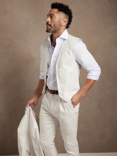 Tailored.  Luxury.  This expertly crafted vest is made from a blend of sumptuous cotton and rich linen for lightweight breathability with tabs at the back waist for a made-to-measure fit.  Wear it as a standalone staple or styled with the matching su Linen Beach Outfits, Beach Outfit Men, Casual Grooms, Italian Alps, Linen Fabrics, Summer Suits, Suit Vest, Father Of The Bride, Vintage Linens